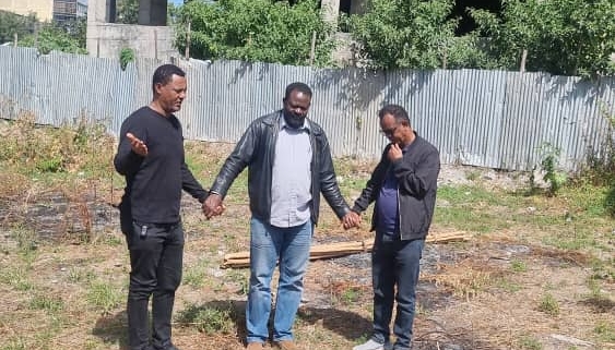 Dr. Okongo Prayed right on the plot of Land and gave us directions