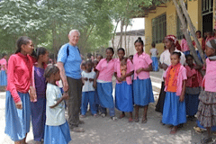 Praying and Dedicating KFLT donated books 2