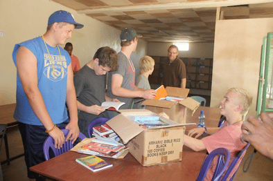 Team sorting books at the library